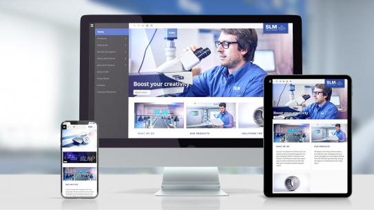 Screenshot der neuen Webseite unseres Kunden SLM Solutions Group AG auf Desktop und Tablet